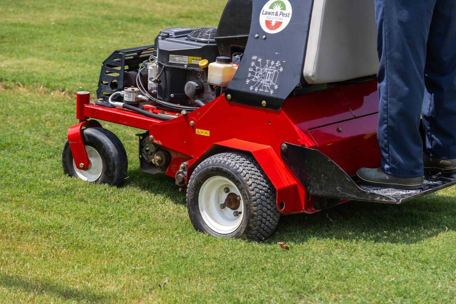 lawn care technician crew truck aerator aerate equipment detail