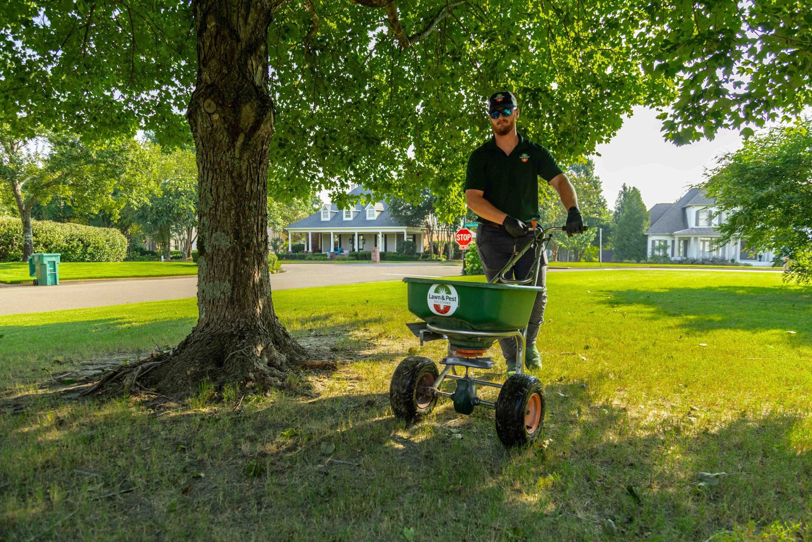 lawn care tree technician crew fertilizer granular spreader turf 2-1