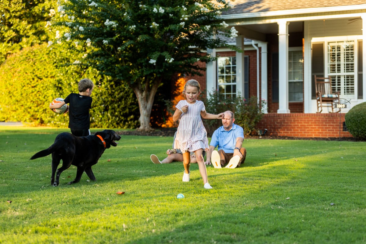 lawn care customers family dog in lawn nice lawn  2