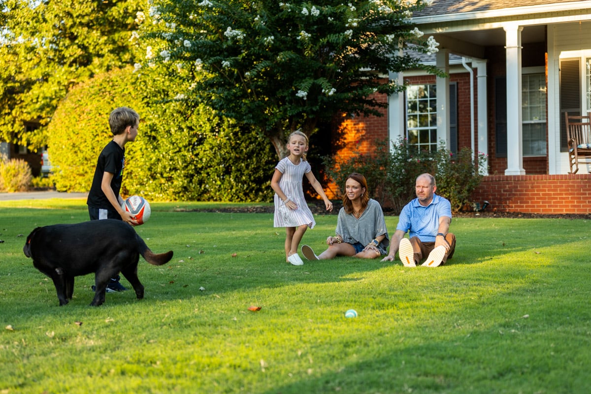 lawn care customers family dog in lawn nice lawn